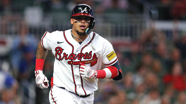 Atlanta Braves shortstop Orlando Arcia hits a single